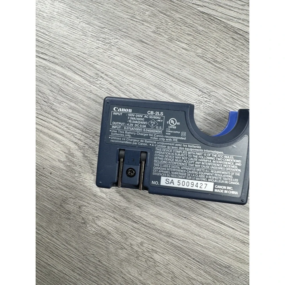 Canon OEM battery charger CB-2LS Power Shot S100 S200 S300 S400 S410 S500 876